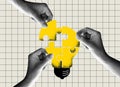 Team metaphor. people connecting puzzle elements of a bulb symbolizing creative idea. Royalty Free Stock Photo